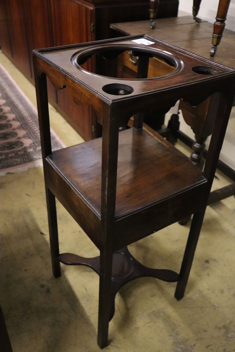 A George III mahogany washstand, width 34cm depth 34cm height 82cm